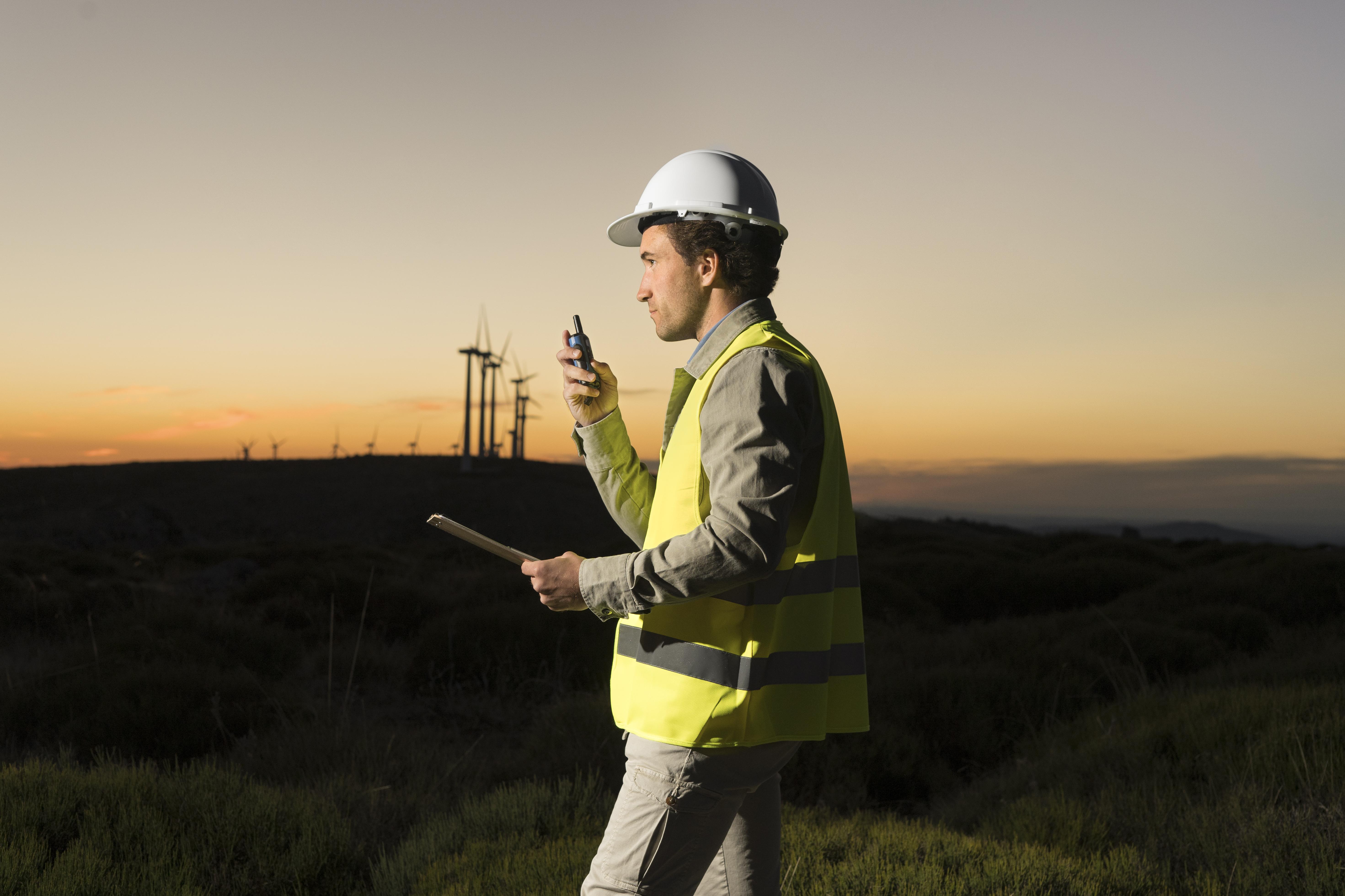 Students collaborating on an architectural model, showcasing teamwork and creativity